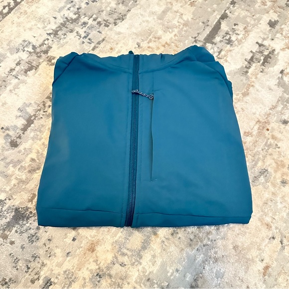 Kirkland Signature Ladies' 4-Way Stretch Water Repellent Jacket, Teal, size L - Picture 6 of 7